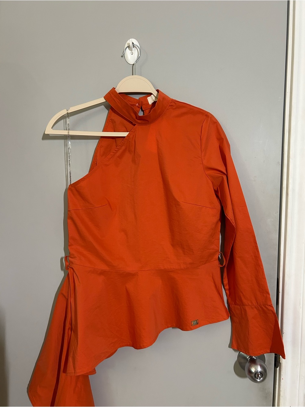 Lizette Collection One-Shoulder Asymmetrical Peplum Blouse in Orange - Picture 2 of 9